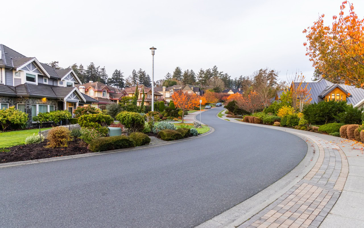 Beautiful suburban street showcasing professional property management and community upkeep.